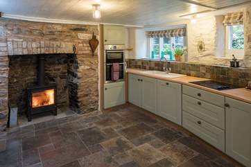 Even the kitchen has a top of the range wood-burning stove.