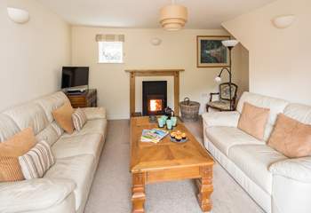 The comfortable sitting-room also has a wood-burner, which is perfect for those cosy nights in.