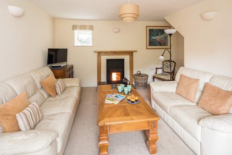 The comfortable sitting-room also has a wood-burner, which is perfect for those cosy nights in.