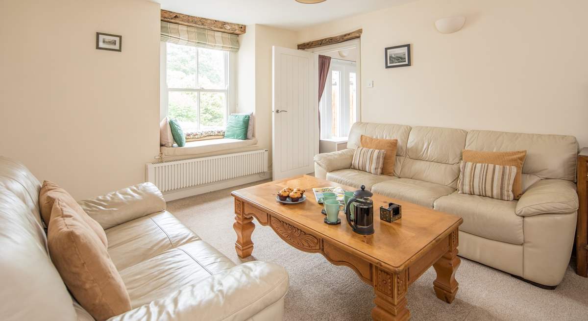 The sitting-room leads through to bedroom 1 and the ground floor shower-room.