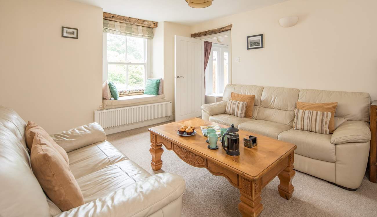 The sitting-room leads through to bedroom 1 and the ground floor shower-room.