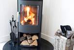 There is under-floor heating throughout and a cosy wood-burner for those chillier months.