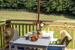Al fresco dining can be enjoyed overlooking the peaceful meadow.