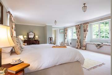 The master bedroom is dual aspect and has a lovely Juliet balcony with views over the garden.