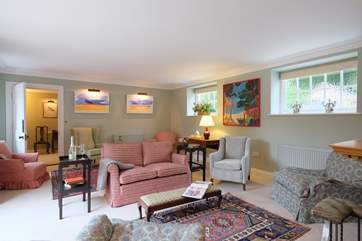 There is plenty of space for everyone to relax in the sitting-room.