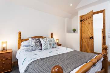 There is a step taking you up into the master bedroom, which is very cosy and snug.