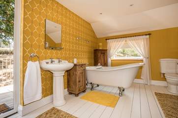 Lie back and have a soak in the roll-top bath