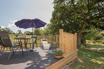 The raised decked area is a great place to enjoy mealtimes al fresco