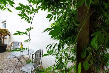 There is a tiny area to sit out at the side of the cottage.