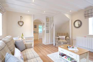 Coastal colours in the open plan sitting/dining-room.