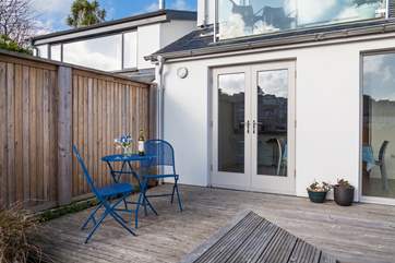 Doors lead onto the decked-area from the kitchen/diner.