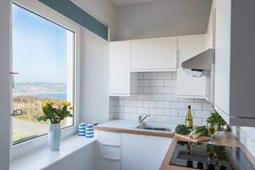The modern kitchen is small but perfectly formed.
