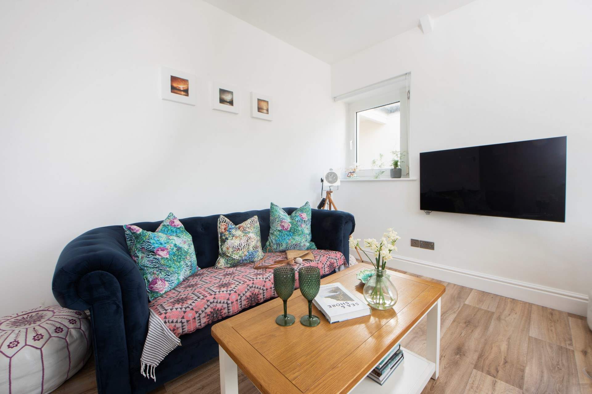 Curl up on the sofa with a good book after a day exploring The Headland.