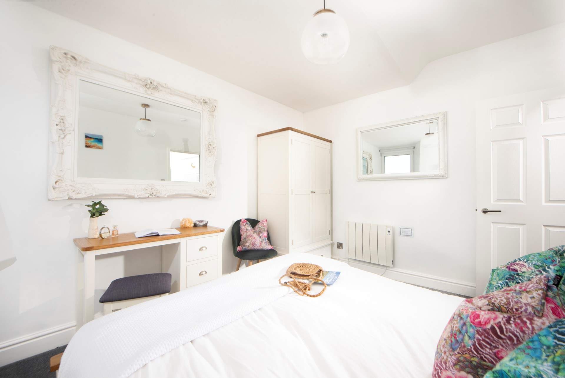 The bedroom has been lovingly furnished.