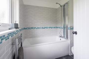 The family bathroom is situated just off the entrance hall, up four steps.
