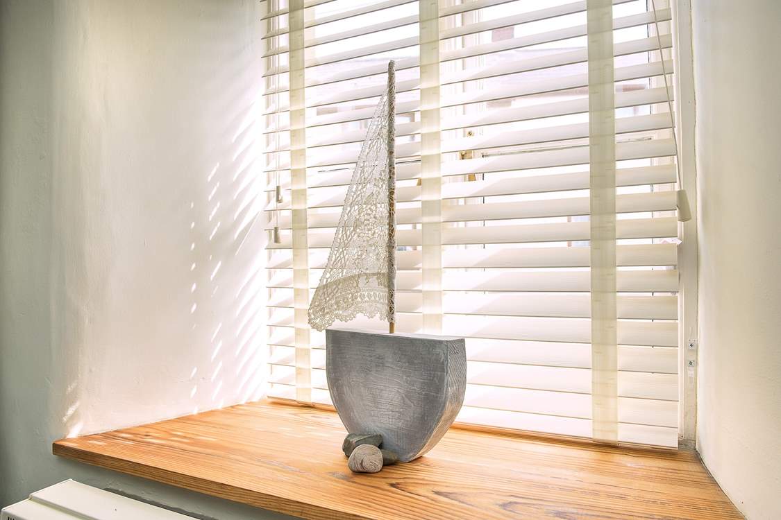 There are lovely touches throughout this tastefully presented cottage.
