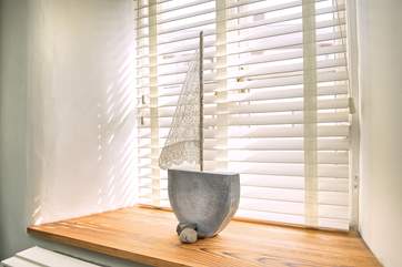 There are lovely touches throughout this tastefully presented cottage.