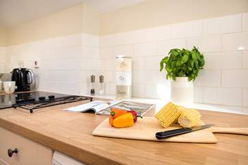 The kitchen is very well-equipped and has plenty of room for everyone to get involved in the cooking.
