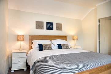 The cottage bedrooms are quite charming.