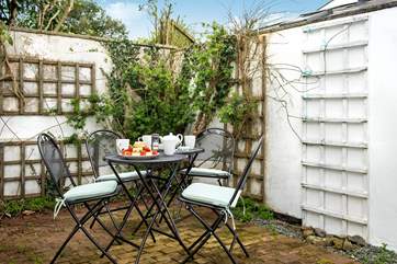Enjoy a morning coffee or afternoon tea in the sheltered courtyard