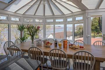 Wonderful water views can be enjoyed from this glorious dining-table.