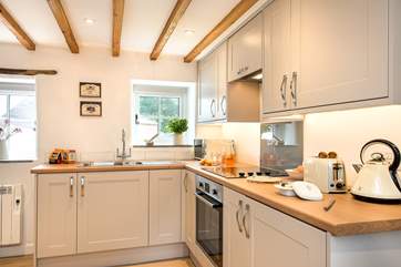 The stylish kitchen overlooks the courtyard.