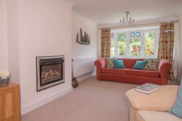 With a log-effect gas fire, put your feet up and enjoy catching up on some reading