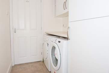 The utility area is located upon entry of the master bedroom