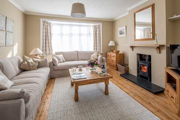 Two large comfy sofas and a cosy wood-burner invite you to relax.