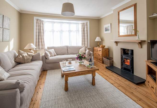 Two large comfy sofas and a cosy wood-burner invite you to relax.