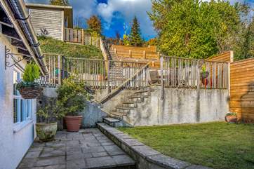 The garden is fully enclosed and has three different levels to choose from, with a garden room at the top - with views over the rooftops to the sea