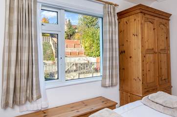 Bedroom 2 has views out over the terraced garden.
