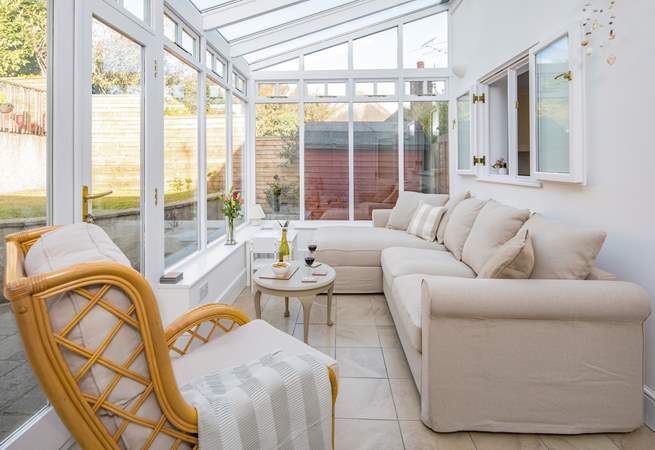 The conservatory has cosy under-floor heating.