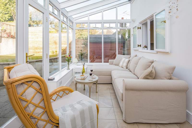 The conservatory has cosy under-floor heating.