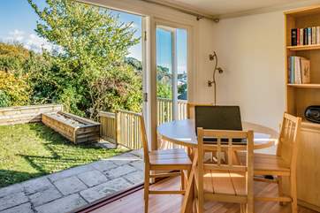 The garden-room is at the very top of the garden, a great place to escape for a quiet read. It is not heated in the winter.