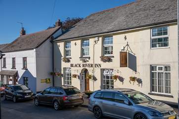 The local pub awaits with a warm Devon welcome.