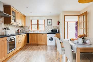The spacious and well-equipped kitchen/diner is perfect for whipping up a feast.
