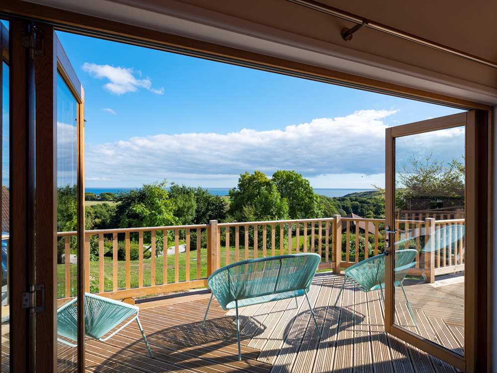 The wonderful view over rolling countryside to the sea beyond.