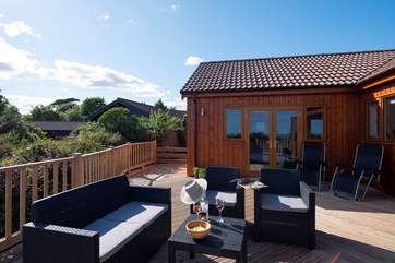 The master bedroom also has bi-fold doors that open onto the deck.