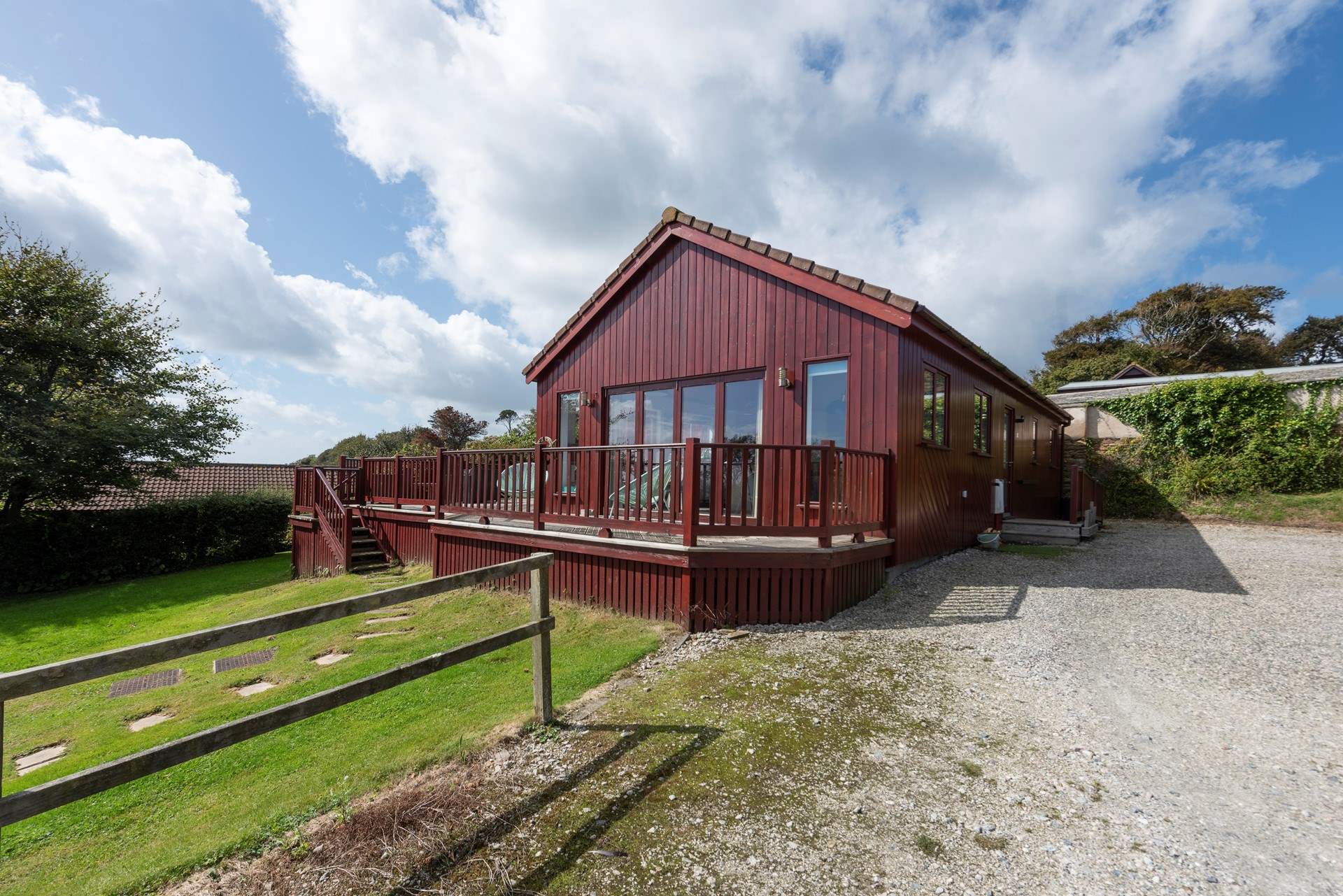 As well as the decking area, The Bolthole has an area of lawn in front of the property to enjoy.