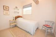 The dressing-room also has a single bed for flexible sleeping options.