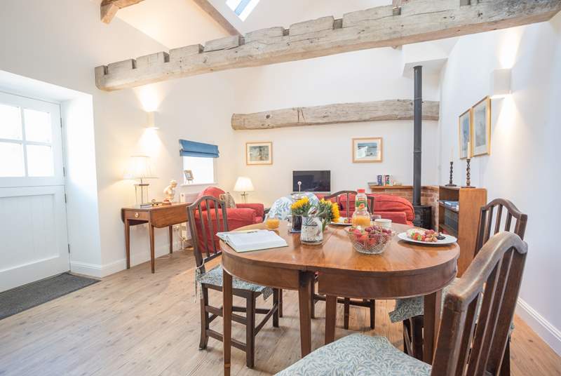 This spacious open plan barn conversion is full of character.