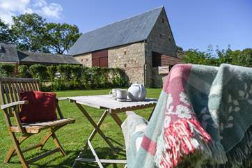 With a lovely garden to sit back and relax in.