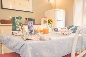 The breakfast-room looks out onto the spacious and enclosed garden.
