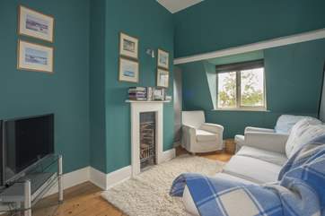 The second floor sitting-room, an ideal playroom for the kids and with additional soft seating.