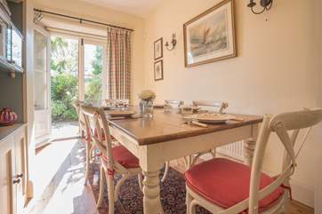 The main dining-table has seating for six. with additional seating in the breakfast-room.