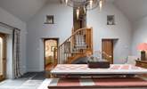 Looking through the dining-room. With the kitchen to the left, bedroom one and en suite to the right and the master staircase to the first floor rooms. - Thumbnail Image