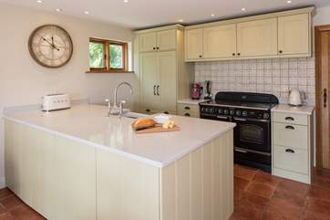 The fully equipped kitchen is completely state of the art, with no expense spared on equipment, gadgets and general facilities. Whipping up a feast will prove a pleasure in this gorgeous kitchen.