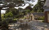 The patio-area is slightly shaded, providing the perfect place to spark up the barbecue and dine al fresco in this superb spot. - Thumbnail Image