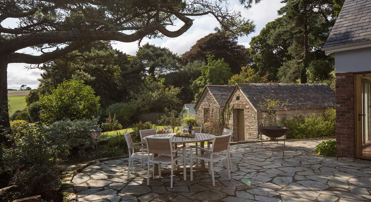 The patio-area is slightly shaded, providing the perfect place to spark up the barbecue and dine al fresco in this superb spot.